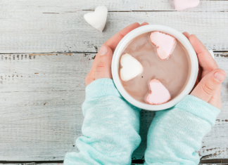 February Family Events Featured Image - Hands holding hot chocolate with heart marshmallows